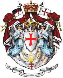 zwei Damen in blauen Gewänern in der Mitte ein Wappen mit rotem Kreuz auf weißem Grund, darüber eine Krone und zwei Flaggen.